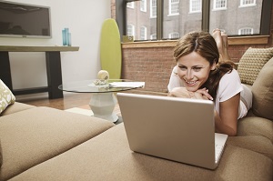 Woman talking on Laptop